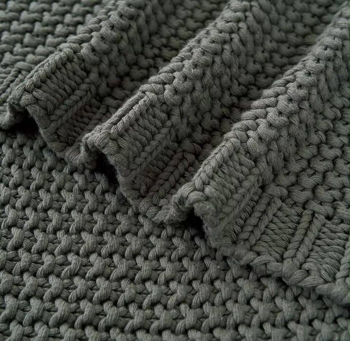 Chunky knit throw blanket caramel orange folded stacked