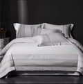 Silver grey Egyptian cotton 1000TC bedding set on king bed – full view with wide border embroidery