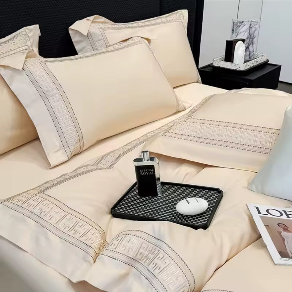 Champagne beige Egyptian cotton duvet cover set with Greek key embroidery – close-up of pillowcases