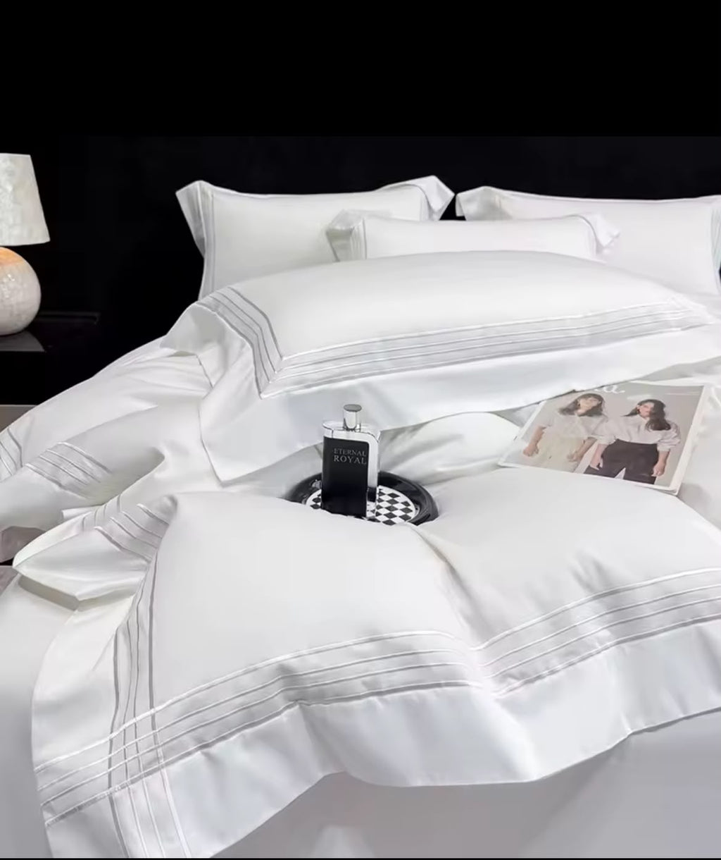 Pure white Egyptian cotton duvet cover with triple-line embroidery – full bed view